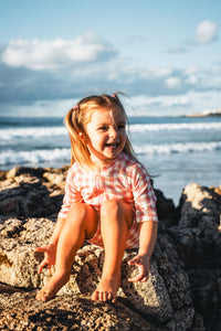 pink checked toddler UV suit