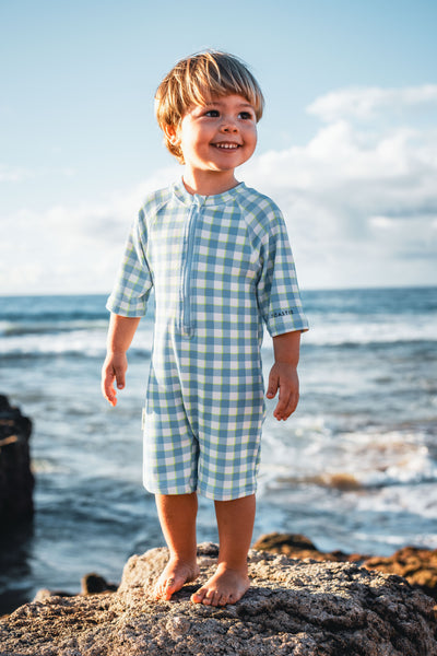 blue gingham SPF50 onesie